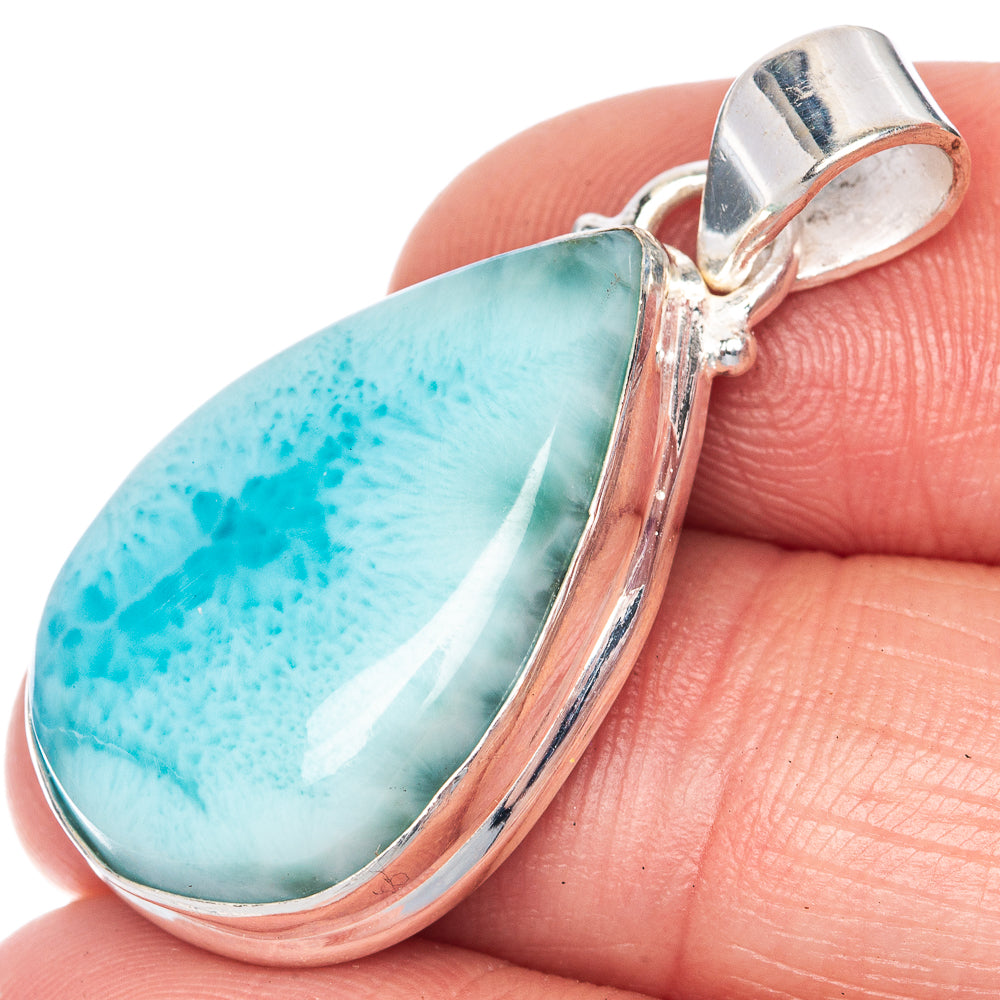 Larimar teardrop pendant in sterling silver bezel, blue-green gemstone close-up