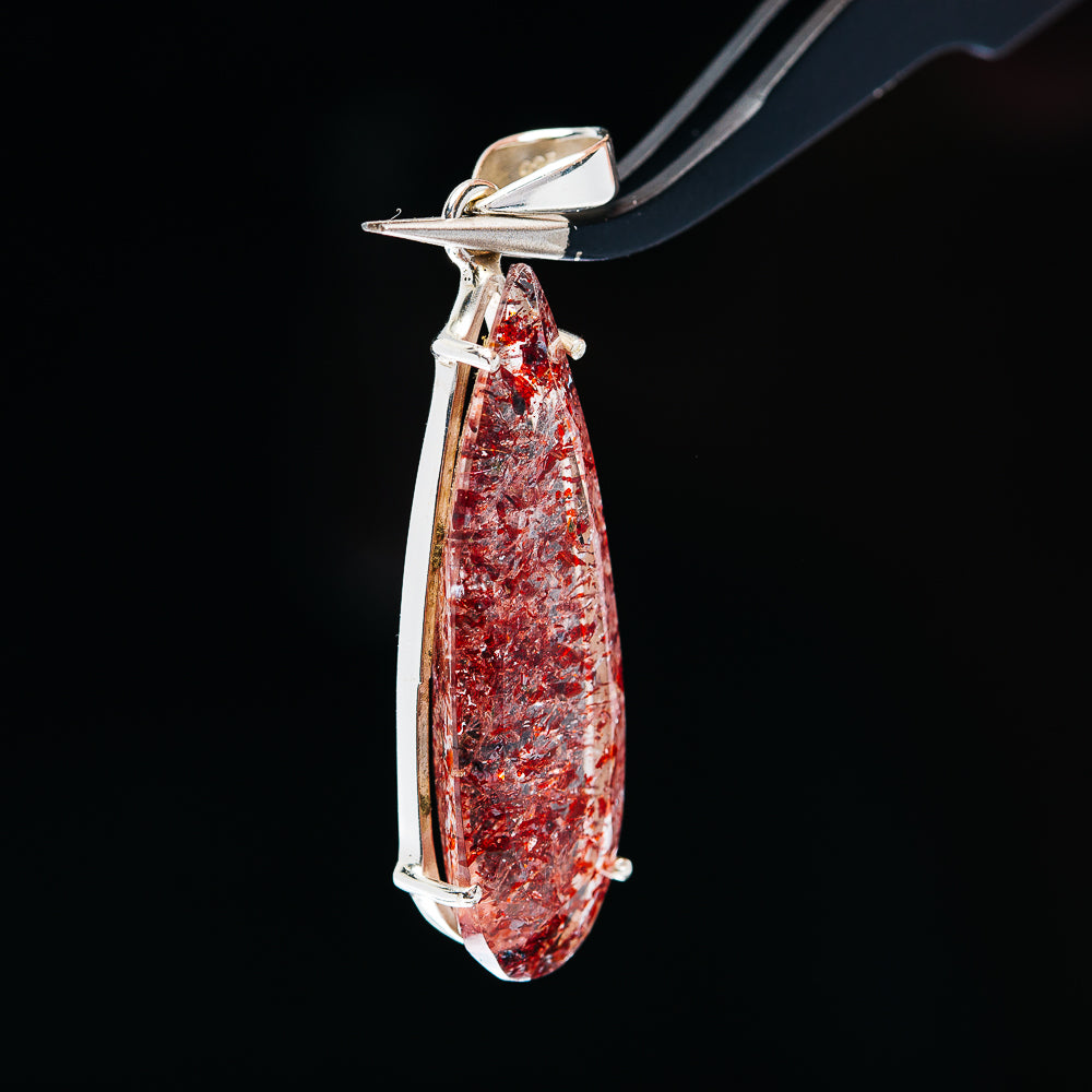 Red faceted lepidocrocite teardrop pendant with .925 sterling silver top frame