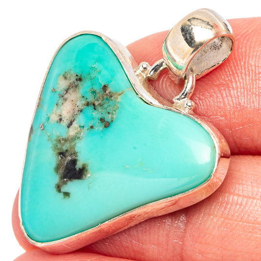 Turquoise heart pendant with speckled stone in .925 sterling silver bail