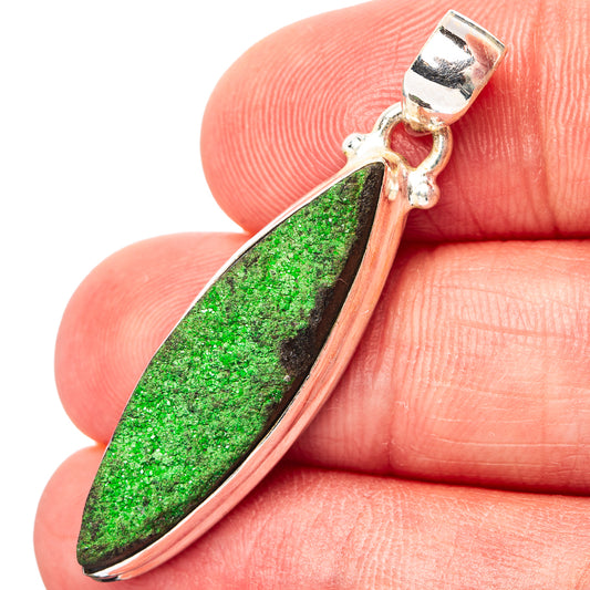 .925 sterling silver uvarovite pendant with green teardrop stone bezel