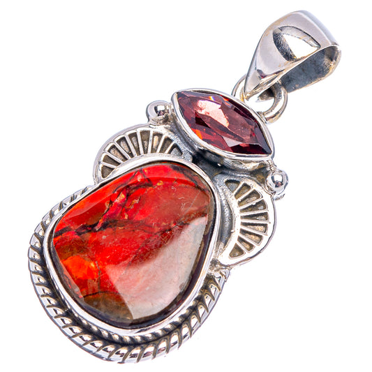Sterling silver ammolite pendant with oval red stones and ornate circular side details