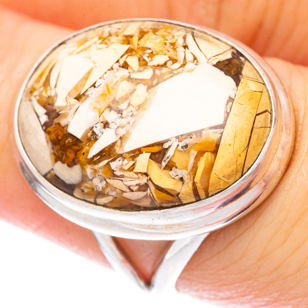 Sterling silver ring with yellow, brown, and white brecciated jasper inlaid center