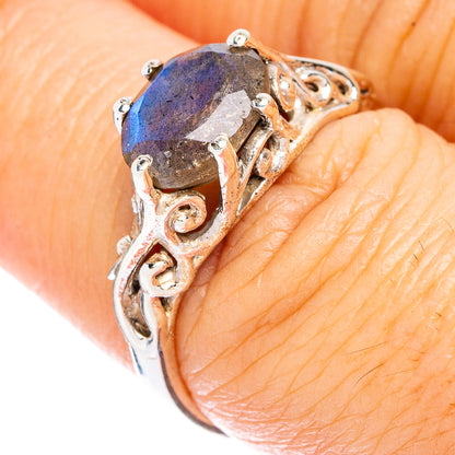925 sterling silver labradorite ring with oval dark blue stone and small clear accents