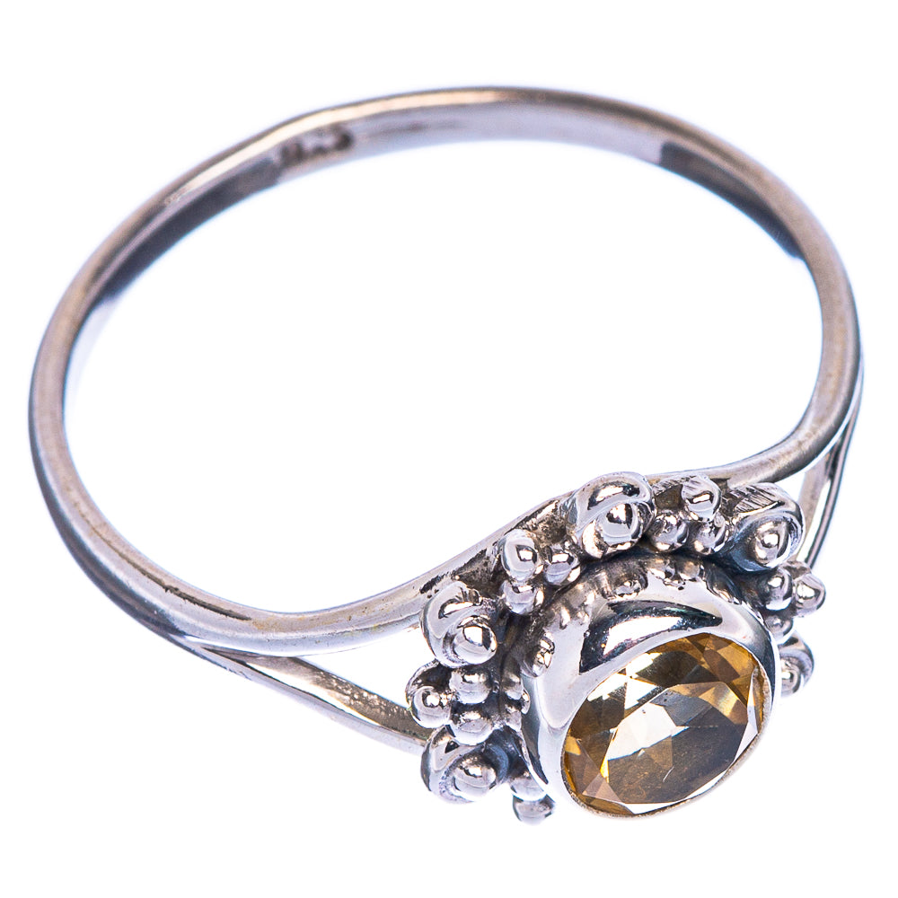 Round faceted citrine ring in sterling silver with clustered bezel prongs, size 8.5