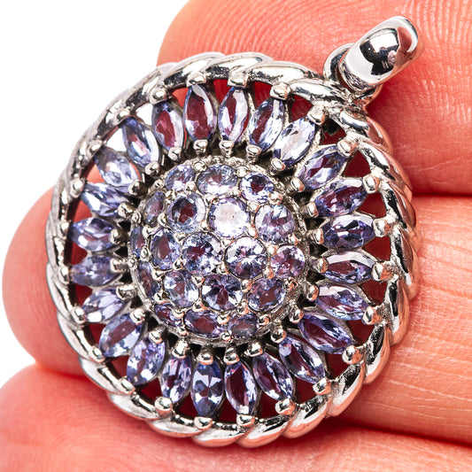 Sterling silver pendant with faceted purple-blue gemstone cluster, round halo