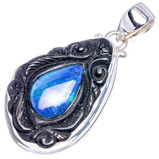 Teardrop doublet opal pendant in sterling silver with blue stone and ornate bail