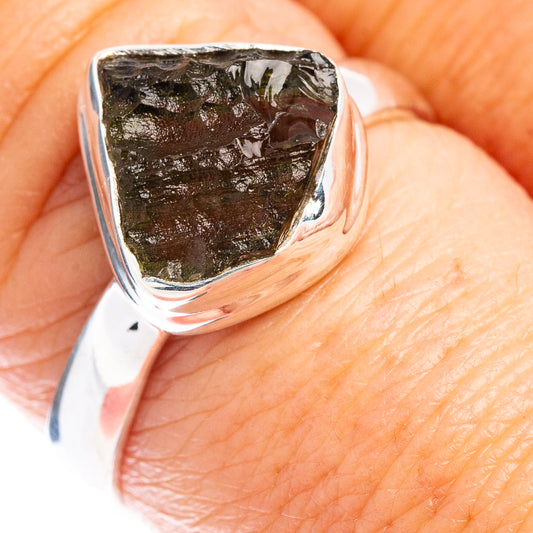 Size 8 sterling silver moldavite ring with dark green rough stone in bezel setting