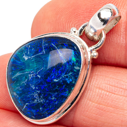 Sterling silver opal pendant with oval-blue stone, clasp bail detail