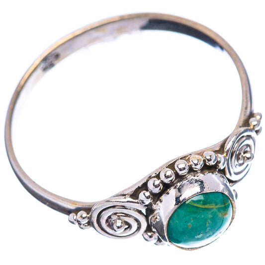 Sterling silver ring with round green turquoise cabochon and spiral beadwork setting