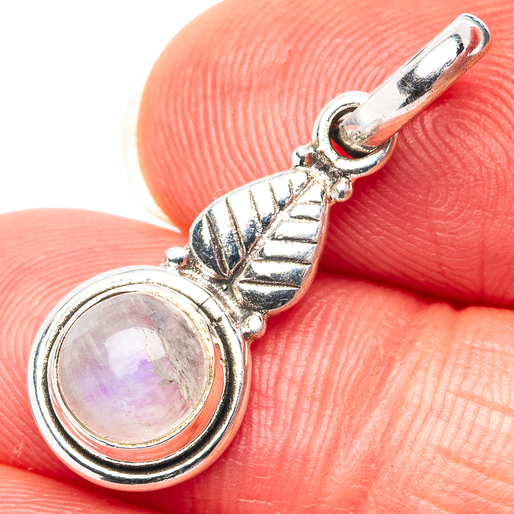 Sterling silver moonstone pendant with iridescent round cabochon, leaf-like frame