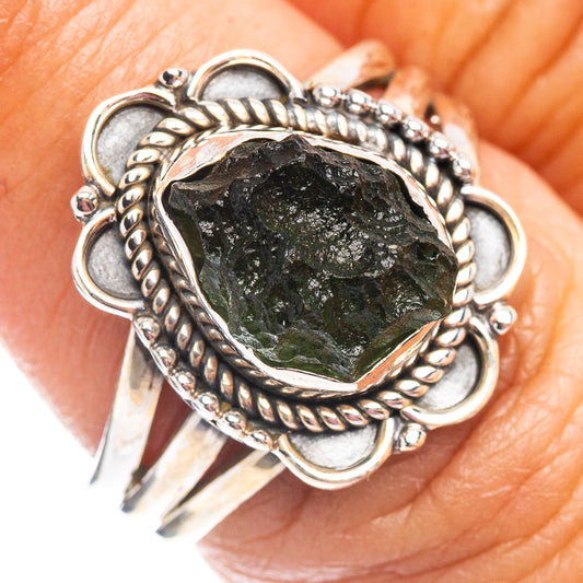 Sterling silver Moldavite ring with rough dark-green stone and rope bezel
