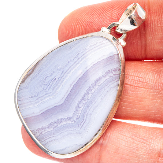 Sterling silver pendant with oval blue lace agate stone and small bail detail