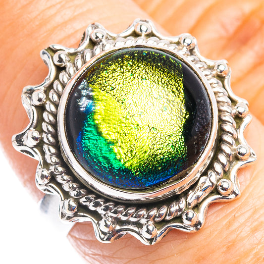 Dichroic glass ring in .925 sterling silver, oval bezel with blue-green iridescent center.