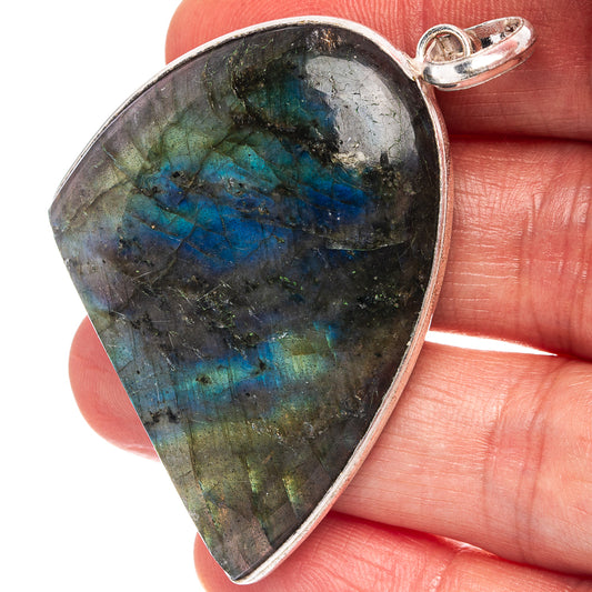 Silver-plated labradorite pendant with teardrop stone and silver loop bail