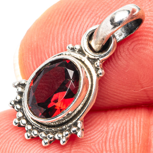 Garnet dainty pendant in .925 sterling silver with oval red gemstone and halo prong setting