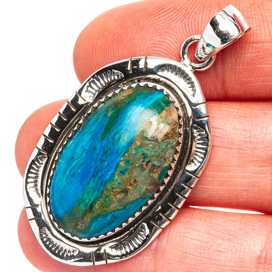925 sterling silver opal pendant with oval blue-green stone bezel.