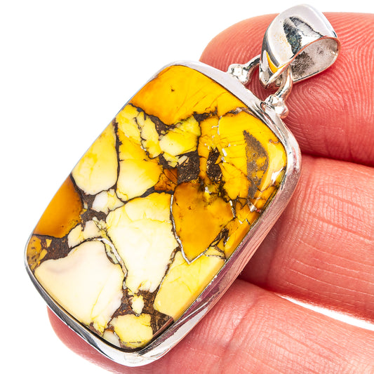 Sterling silver pendant with rectangular yellow stone and white veining, silver bail