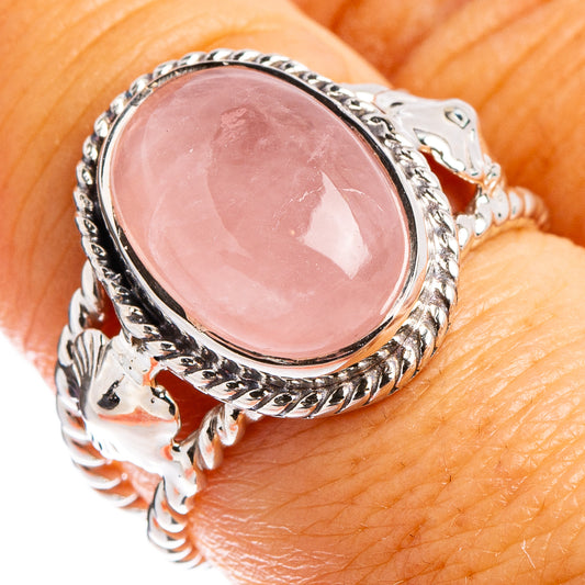 Oval rose quartz cabochon ring in ornate .925 sterling silver bezel, size 7.75