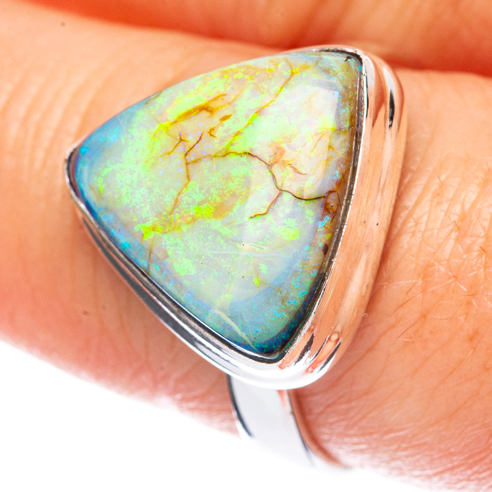 Sterling silver opal ring with oval cabochon, yellow-green and blue shimmer