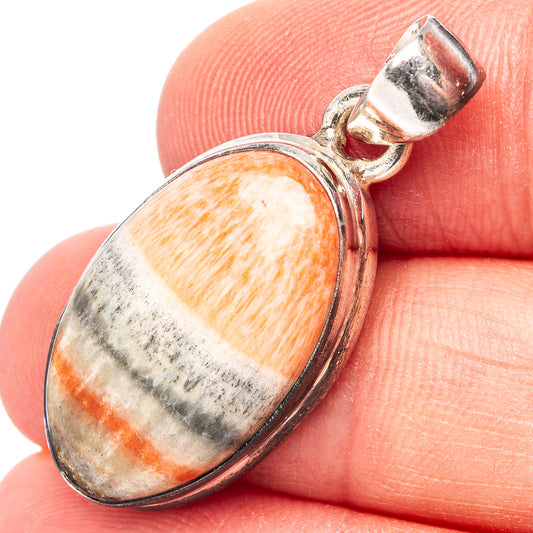 Sterling silver oval pendant with loop bail and orange-white-gray stone cabochon
