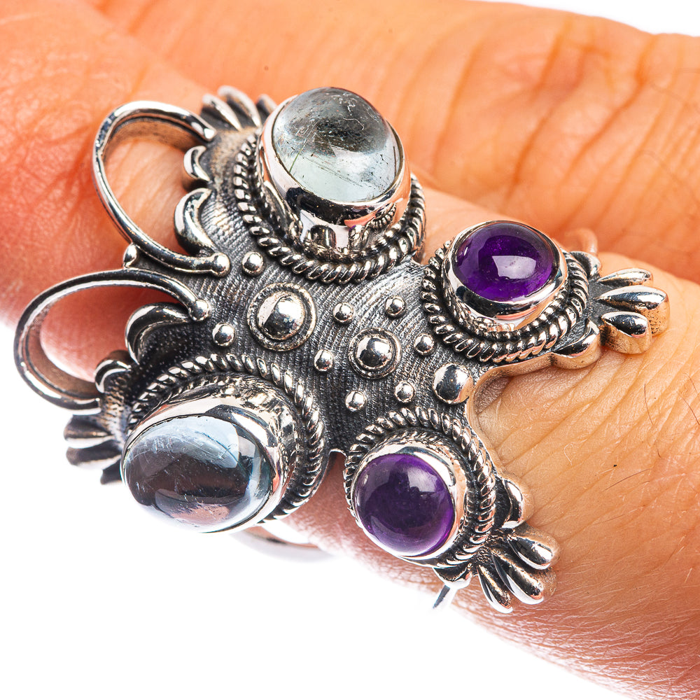 Sterling silver statement ring with aquamarine blue and three amethyst purple cabochons