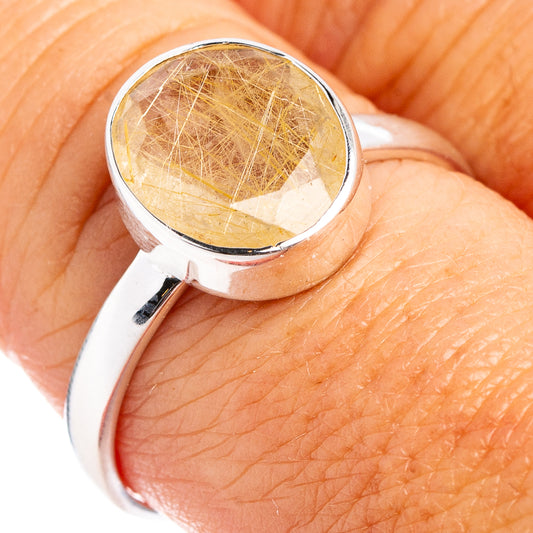 Sterling silver rutilated quartz ring with round bezel, golden needle-like inclusions
