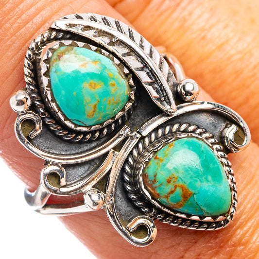 Sterling silver ring with turquoise oval stones and ornate braided setting, size 8