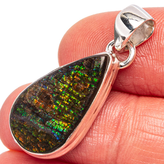 Sterling silver ammolite teardrop pendant with iridescent green-blue mosaic stone