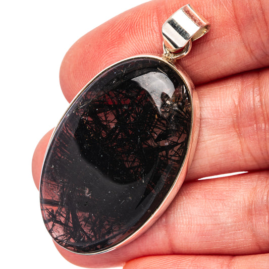Oval tourmalinated quartz pendant in .925 sterling silver, dark black with red needles