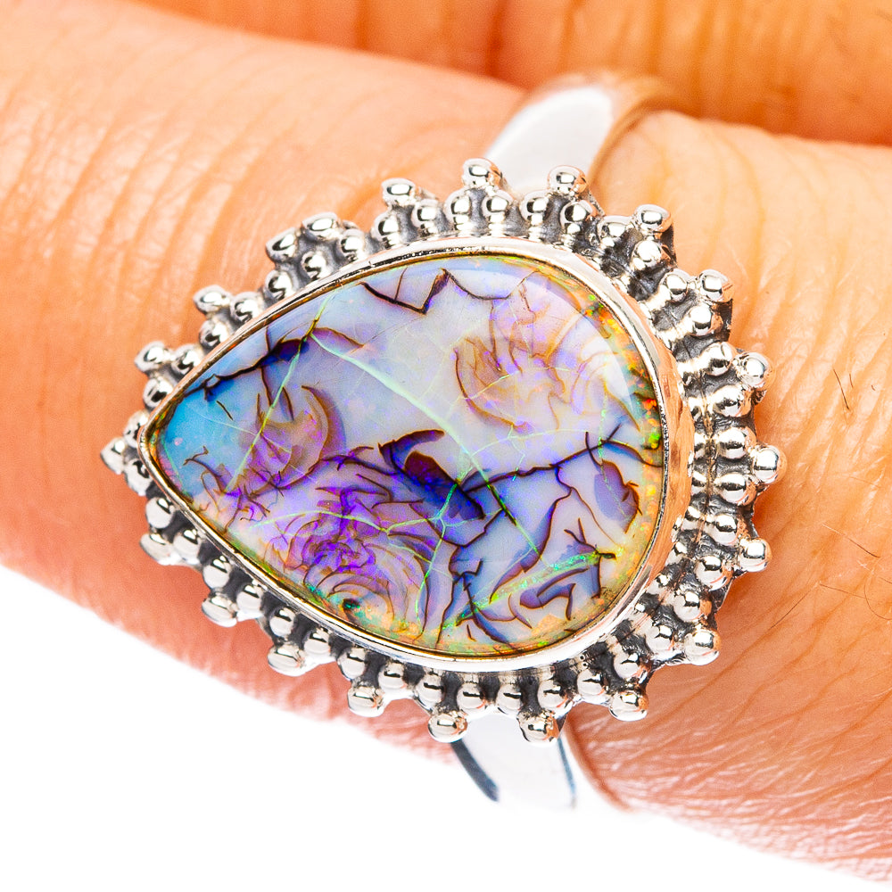 Sterling silver oval opal ring with prong halo, iridescent blue purple stone