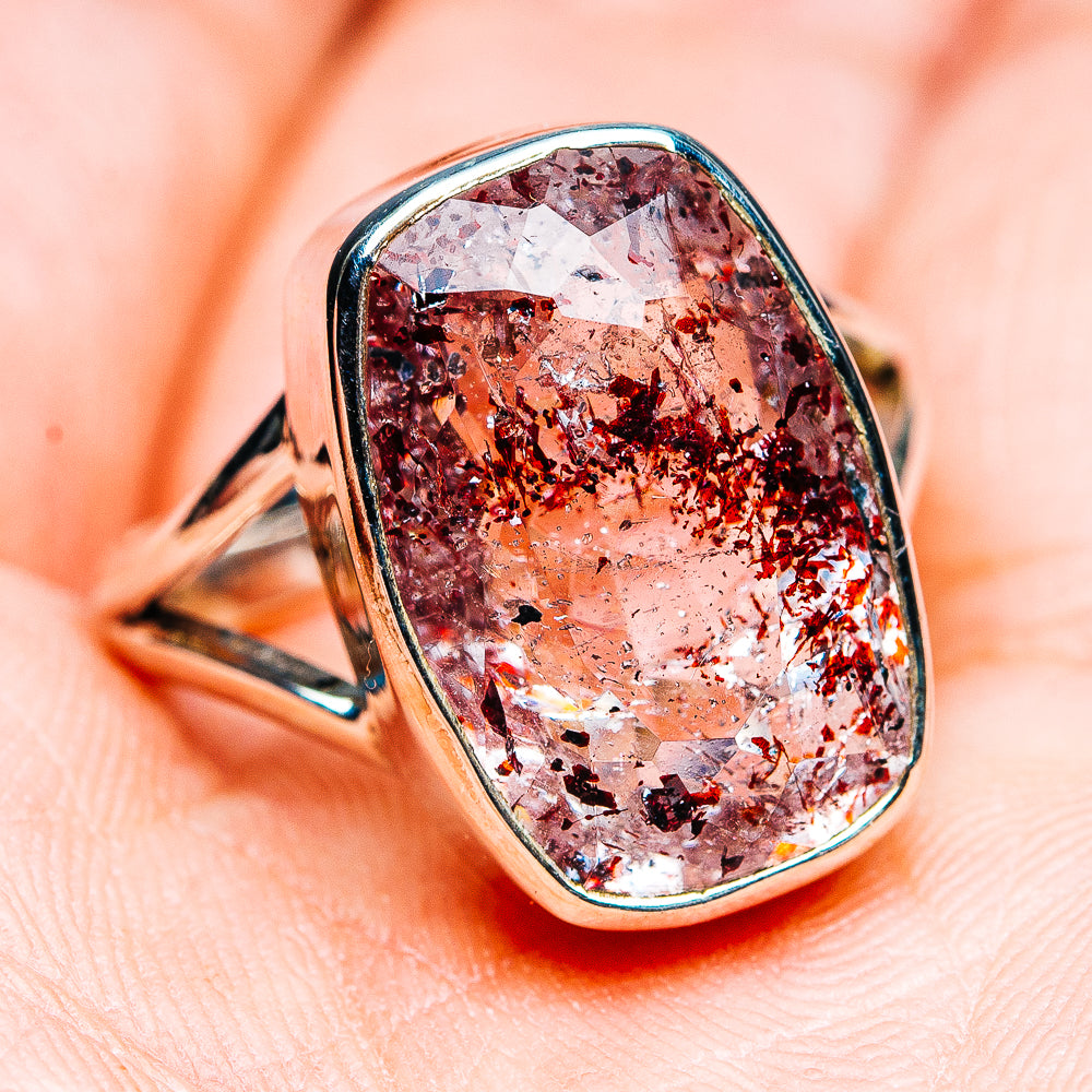 Oval lepidocrocite ring in .925 sterling silver, faceted reddish crystal center