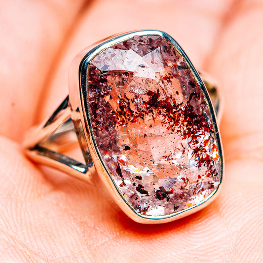 Oval lepidocrocite ring in .925 sterling silver, faceted reddish crystal center