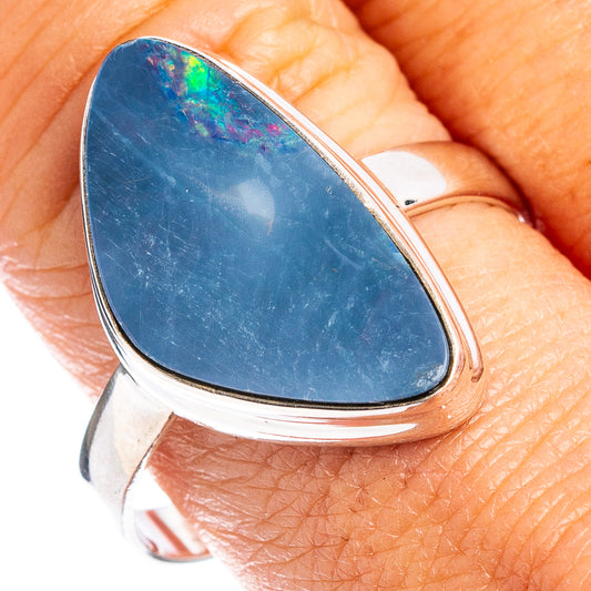Sterling silver opal doublet ring with oval blue stone, rounded bezel setting