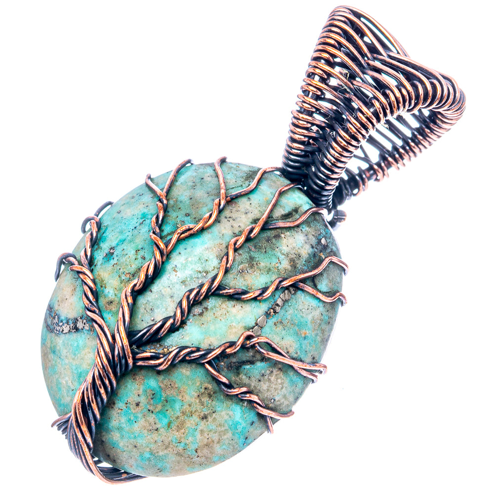 Turquoise oval pendant with oxidized copper wire tree-of-life design