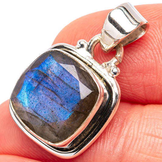 Sterling silver labradorite pendant with oval faceted gemstone, vivid blue flash bezel