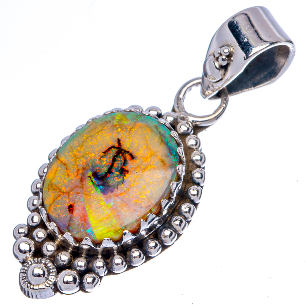 Oval opal cabochon sterling silver pendant, ornate beaded bezel and bail loop