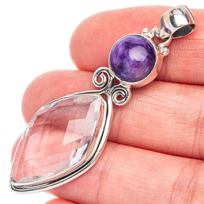 925 sterling silver pendant with purple charoite cabochon and clear quartz drop