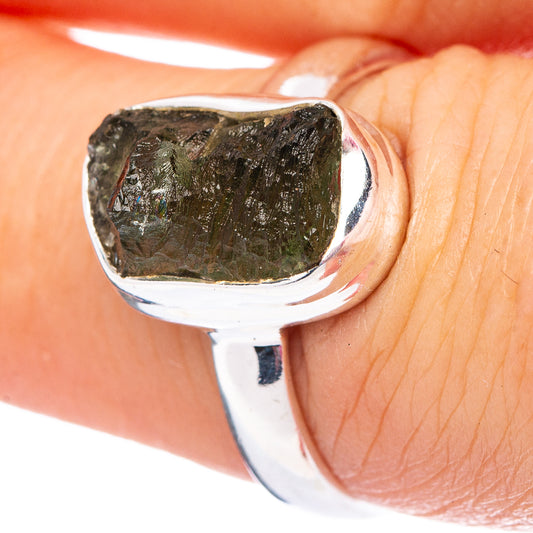 Sterling silver ring with dark green moldavite cabochon, oval bezel setting