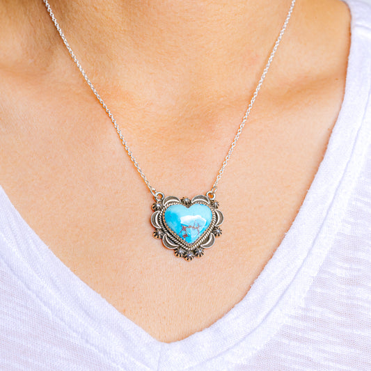 Sterling silver necklace with turquoise heart pendant on thin chain