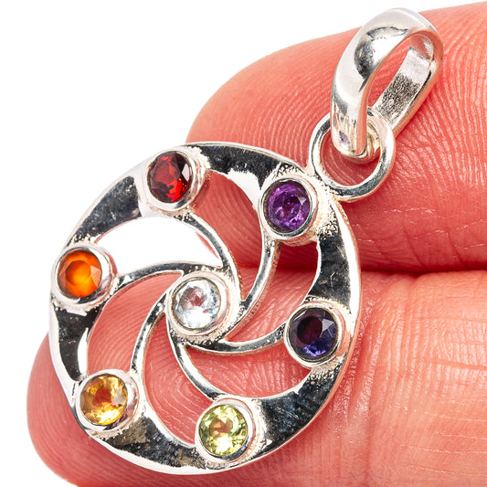 Sterling silver circular chakra pendant with multicolor gemstone inlays and top bail.