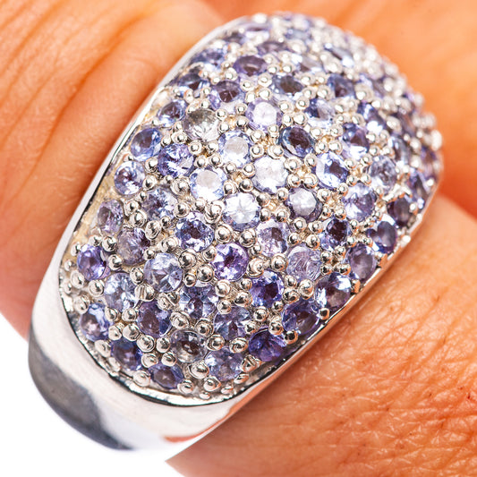 Sterling silver ring with oval cluster of blue and purple gemstones