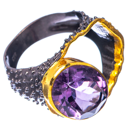 Amethyst black rhodium plated ring, oval purple stone in gold bezel on textured black band
