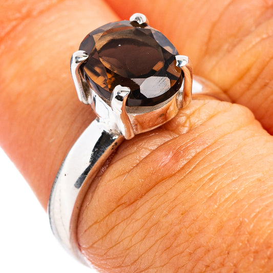 Faceted smoky quartz ring in .925 sterling silver, prong-set oval stone top view