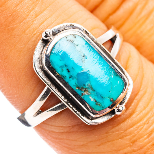 Sterling silver turquoise oval cabochon ring with bezel and side prongs