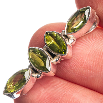 Dainty peridot pendant with three marquise green stones in sterling silver bezels