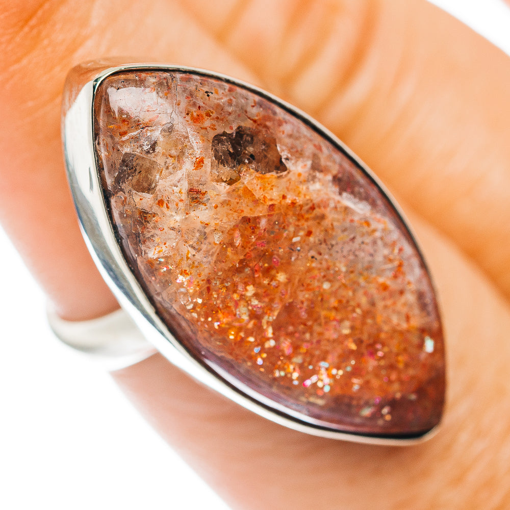German silver ring with oval orange sunstone cabochon, sparkling textured surface