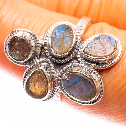 Sterling silver labradorite ring with oval blue and brown gemstone settings