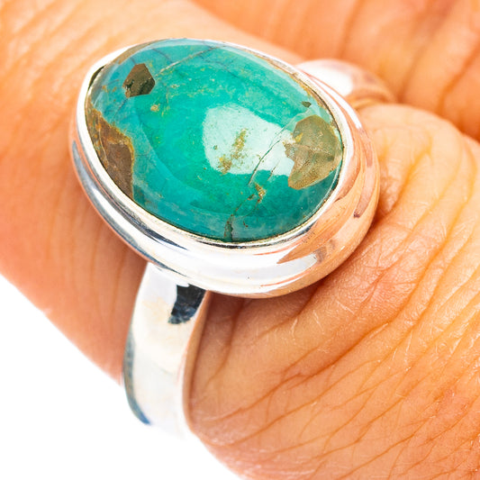 Oval turquoise cabochon sterling silver ring with polished band