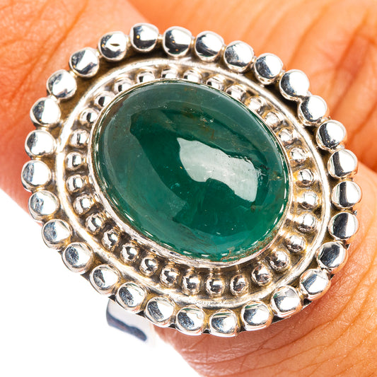 Sterling silver emerald cabochon ring with round bead halo, green oval center