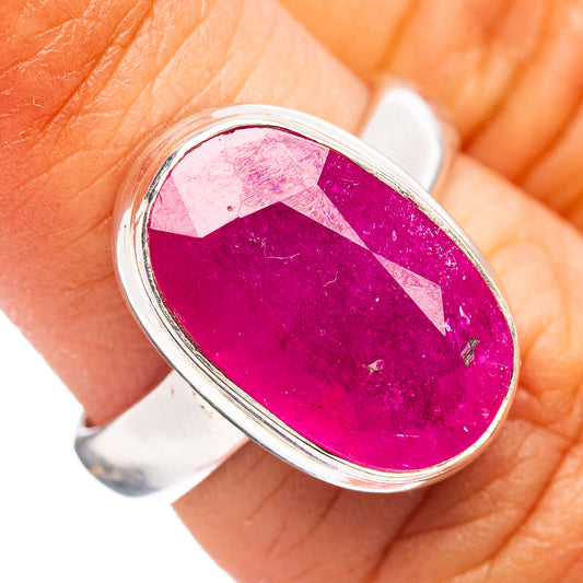 Oval pink ruby-colored glass-filled ring on .925 sterling silver band, size 6.